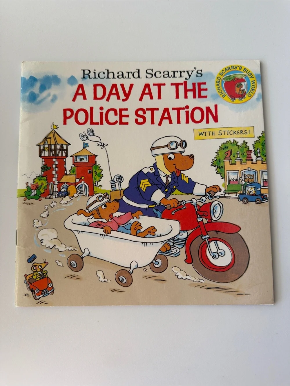 's A Day at the Police Station - Children's Sticker Book (White/Red)